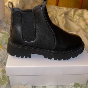 Never worn black boots!